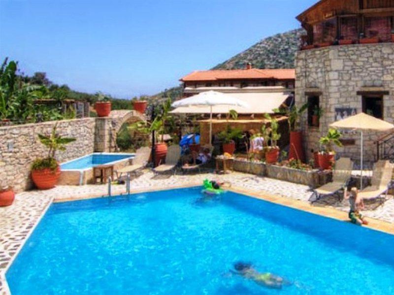 Stone Village מלון דירות 4*